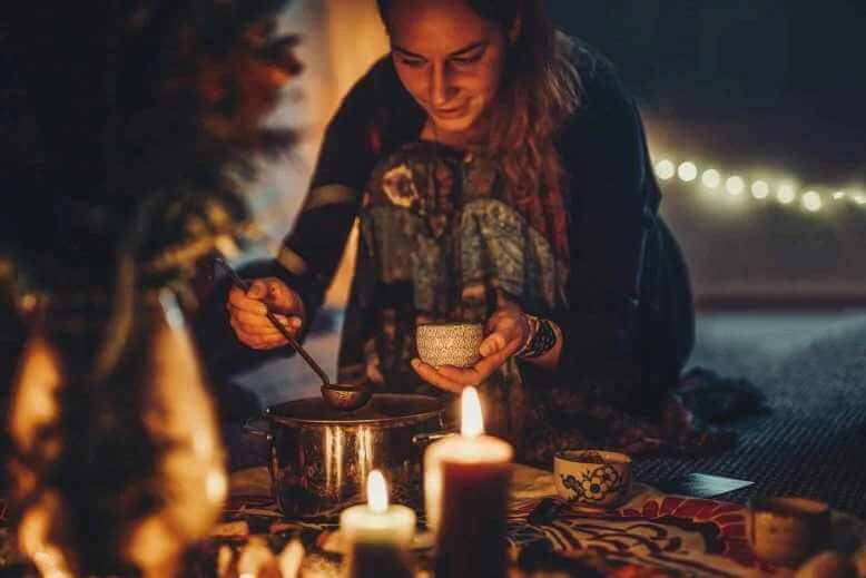 woman performing cacao ceremony